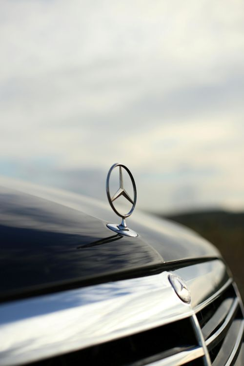 Close up of a Mercedes badge