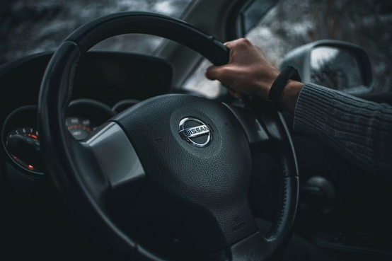 Nissan sell car close up of steering wheel