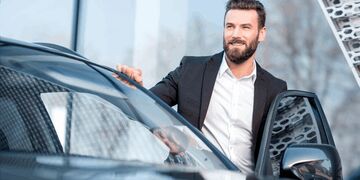 guy coming out of the car